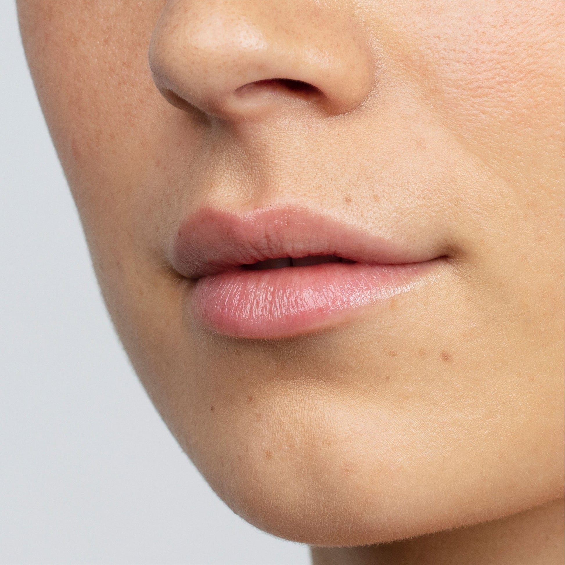 Antipodes Kiwi Seed Oil Lip Conditioner texture close-up